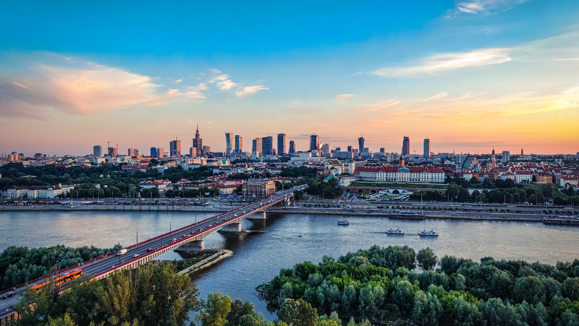 Warsaw skyline at sunset over the Vistula river